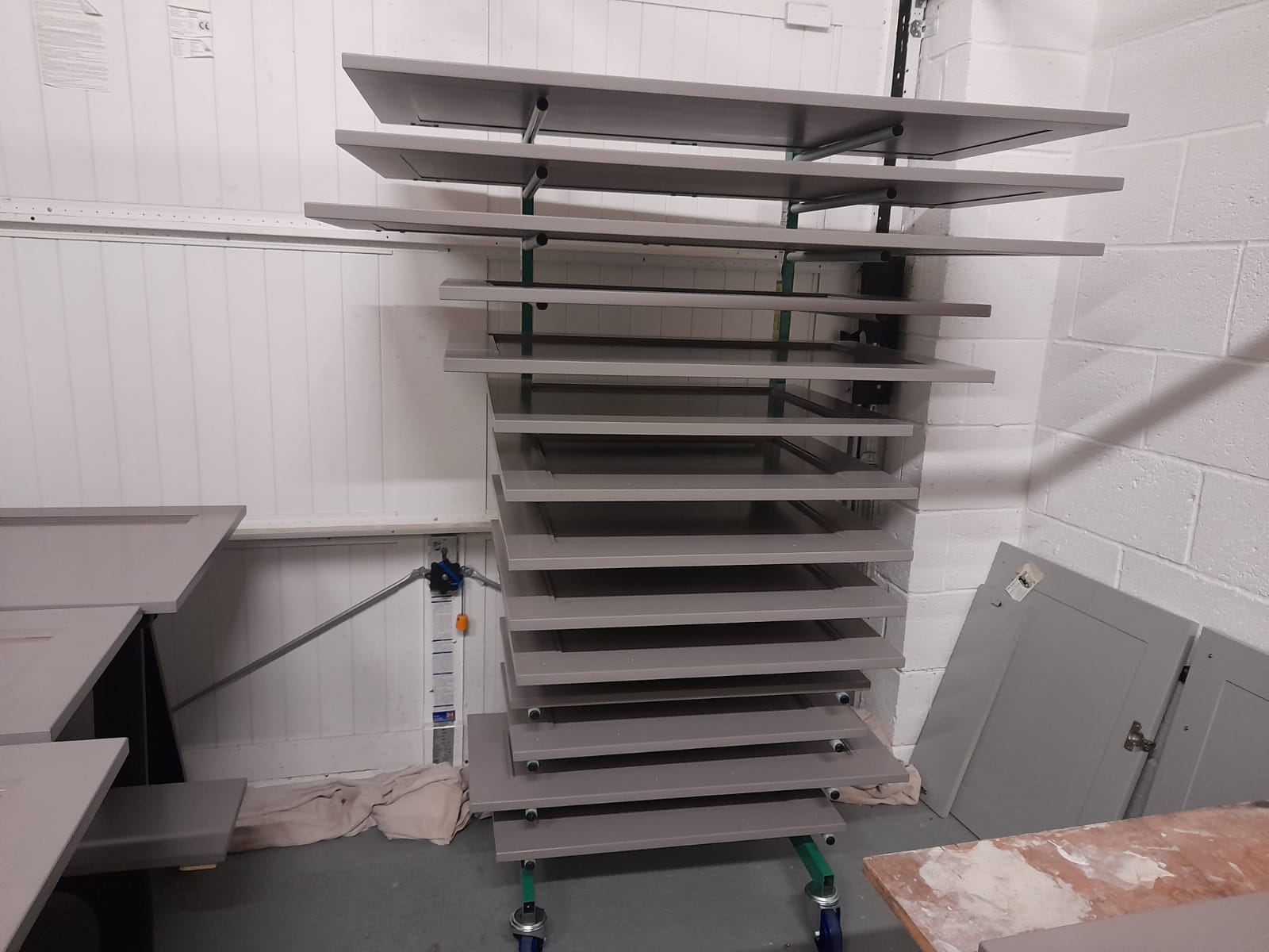 Cabinet doors after preparation for hand-painting a kitchen in Leeds by Gareth Thompson Decorators