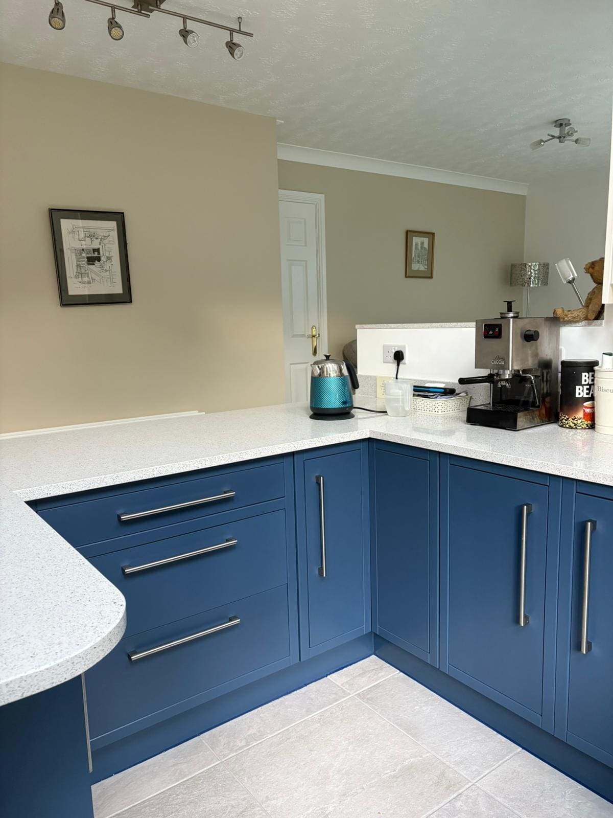 Refinished kitchen units with a striking blue contrast in Leeds